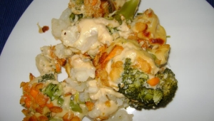 Crumble de brócoli y coliflor con avena y queso